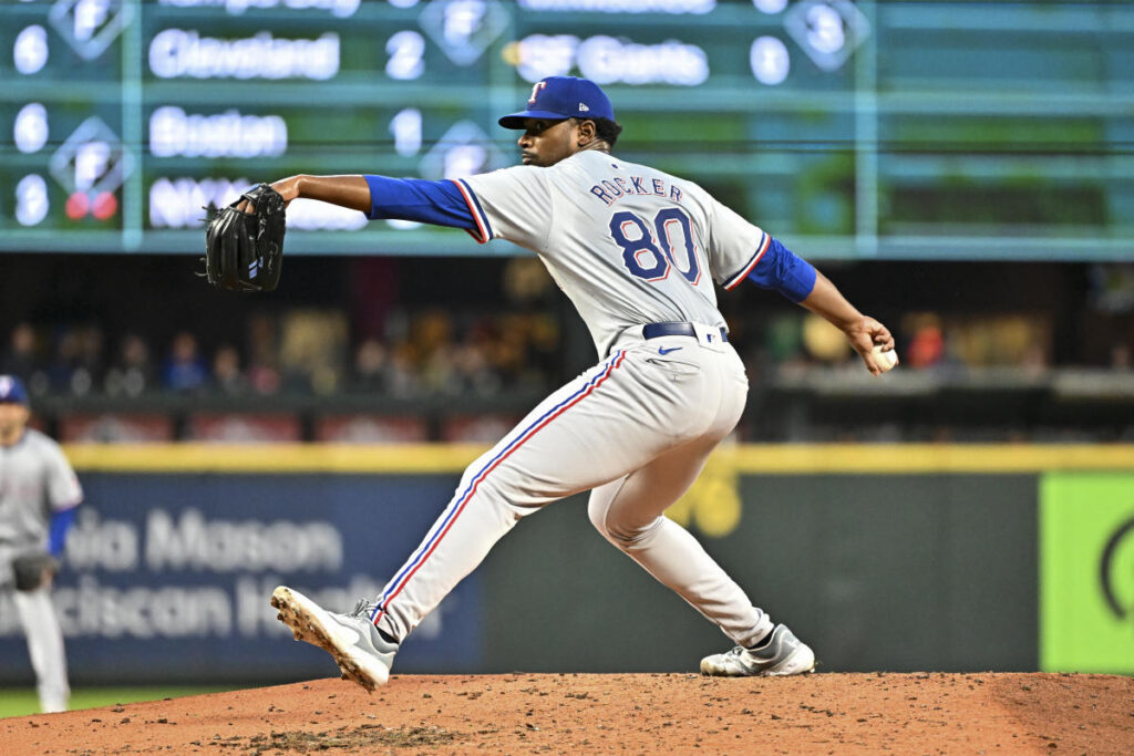 Rangers call-up Kumar Rocker hits 7 in electric MLB debut